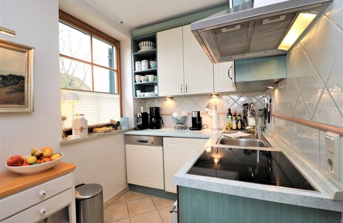 Wieck auf dem Darss Apartment | Ferienwohnung mit Terrasse mit Blick auf den Bodden und Garten