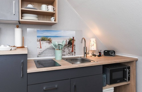 Neuharlingersiel Apartment | Ferienwohnung Ankerplatz im Gästehaus Kock