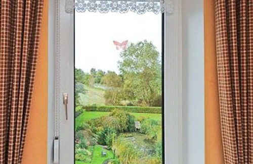 Ostbense Apartment | Ferienwohnung Inselblick - Landhaus Schwanenhof in Ostbense