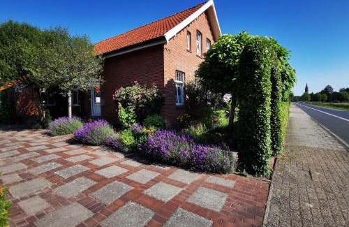 Rhauderfehn Apartment | Ferienwohnung Heckmann, 95138
