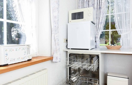 Dunum Apartment | Ferienwohnung Kornblume - Ferienwohnungen Kornblume und Löwenzahn im Haus Sassenhof