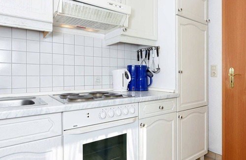 Dunum Apartment | Ferienwohnung Kornblume - Ferienwohnungen Kornblume und Löwenzahn im Haus Sassenhof