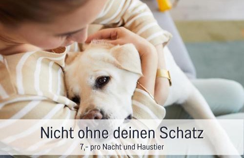 Steinberg Apartment | Ferienwohnung Lichtinsel - strandnah, ebenerdig, haustierfreundlich, großer Garten, optimal für Familien