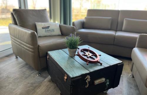 Marienleuchte Apartment | Ferienwohnung Marienleuchte - BeltBlick 1 - Erste Reihe Meerblick, 2 Schlafzimmer, Garten
