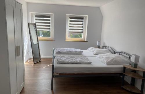 Flensburg Apartment | Ferienwohnung mit Balkon und Garten OG