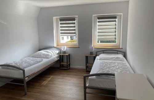 Flensburg Apartment | Ferienwohnung mit Balkon und Garten OG