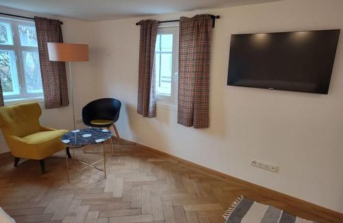 Oberstaufen Apartment | Ferienwohnung RESL - geschmackvoll renoviert & zentral im historischen Schindelhaus