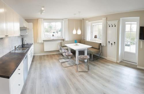 Bunsdorf Apartment | Ferienwohnung Seegras - mit Spielscheune, direkt am Wittensee