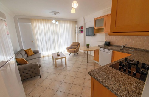Fethiye City Center Apartment | fethiye , ground floor, beachfront, one bedroom, 24/7 security, private beach