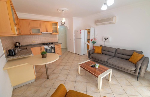 Fethiye City Center Apartment | fethiye , ground floor, beachfront, one bedroom, 24/7 security, private beach