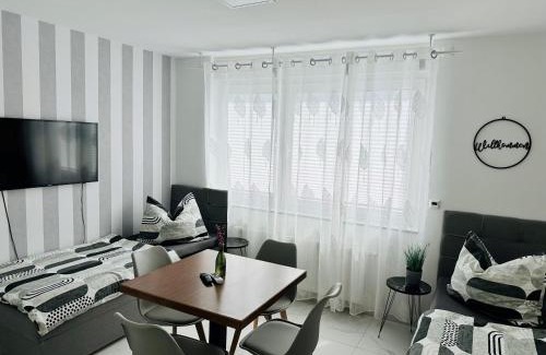Langen Apartment | FeWo BEE61 * Langen EXKLUSIV für 4 Personen *Vollausstattung mit Küche* inklusive TERRASSE