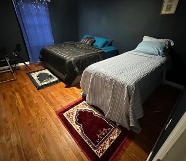 Irvington House | Fidelia Amethyst Room, King Bed and Twin Bed with Private Bathroom Minutes From Newark Liberty International Airport and Newark Penn Station