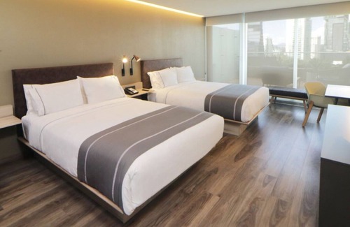 Providencia Hotel | Find Relaxation and Comfort in a Vibrant Guadalajara Room - 3 Units
