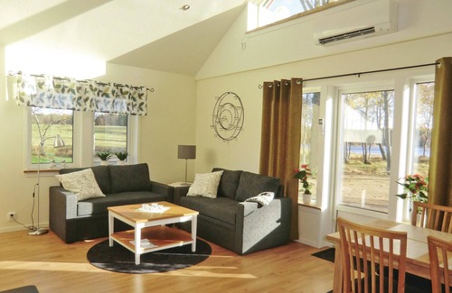 Perstorp House | Fine cottage on the edge of the forest with fireplace and large terrace on a lake property on the ed