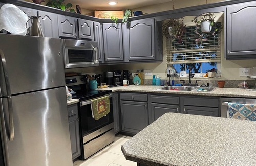 Port Orange House | FINS UP 3-bedroom 2 bath near beach house private pool,hot tub & outdoor kitchen