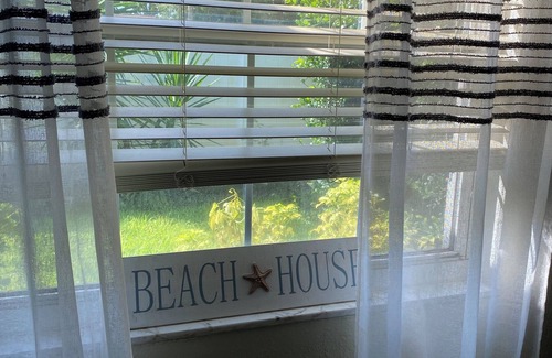 Port Orange House | FINS UP 3-bedroom 2 bath near beach house private pool,hot tub & outdoor kitchen