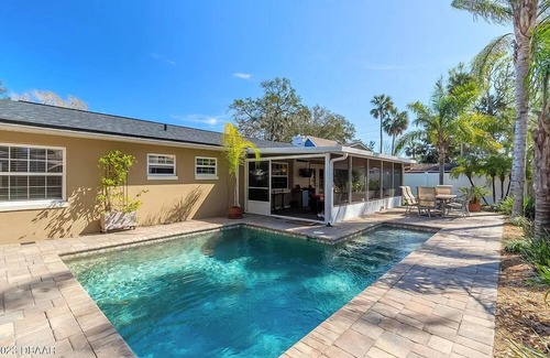 Port Orange House | FINS UP 3-bedroom 2 bath near beach house private pool,hot tub & outdoor kitchen