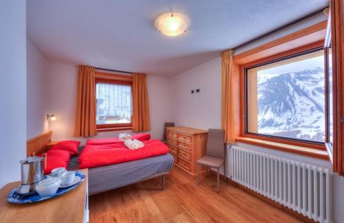 Sant'Anna Apartment | Fiocco Di Neve Ski in- Ski out 10m - Happy Rentals