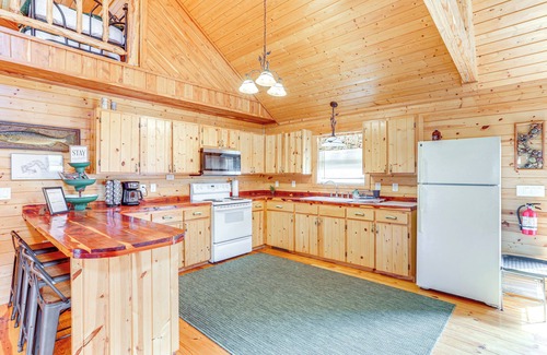Boswell Cabin | Fire Pit, Screened Deck: Riverfront Ozarks Cabin!