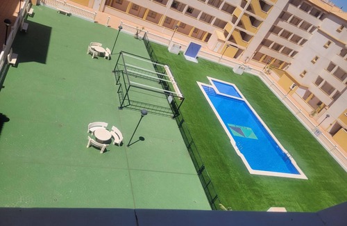 Mar de Cristal Apartment | First floor apartment with palm garden and pool near the beach