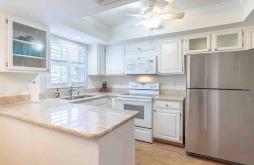Moorings Apartment | First Floor Condo near Pool and hot tub. 1.2 miles to beach.