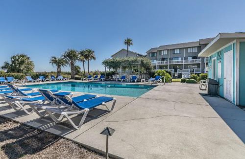 Oceanmarsh Subdivision House | First Floor Condo - Walking distance to beach and pools!