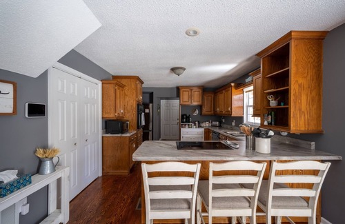 Groveoak House | Fish and Frolic Holiday – Lakefront Home with Boathouse, Porches & Fire Pit
