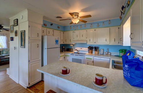 Brigands' Bay House | Fisherman's Dream, Cozy Canal Front W/ Private Dock, Kayaks, & Dog Friendly