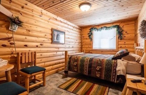 Neillsville Cottage | Fits up to 10 people in this bunk house located at the Riviera Resort in Neillsville, Wisconsin.