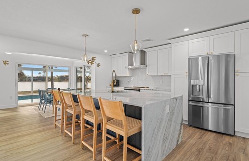 Sanibel House | Five Palms: Coastal Retreat w Private Pool on Lake