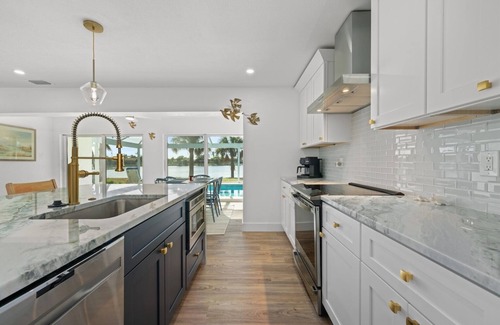 Sanibel House | Five Palms: Coastal Retreat w Private Pool on Lake