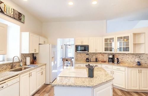 Palm Harbor House | Five Star 3bd Waterfront Canal Home w/Private Pool/Spa & Boat Dock.
