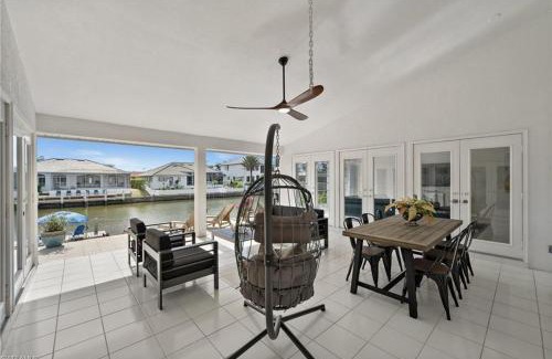 Vanderbilt Beach House | Flamingo Beach House - Water Lot - Canal View