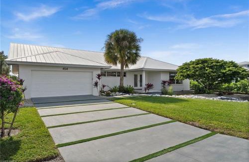 Vanderbilt Beach House | Flamingo Beach House - Water Lot - Canal View