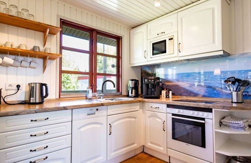 Norgaardholz House | Flintholmhus on the Baltic Sea beach