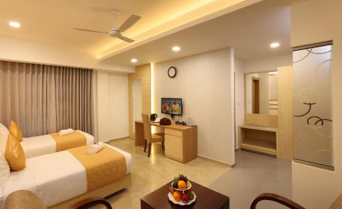 Aluva Hotel | Flora Charishma Residency Aluva