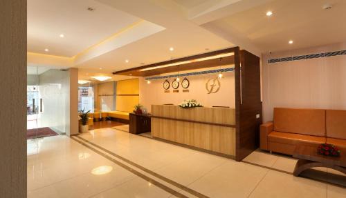 Aluva Hotel | Flora Charishma Residency Aluva