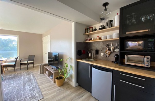 Langlois Apartment | Floras Lake Getaway - charming apartment with view of Lake with Kayaks, SUPs