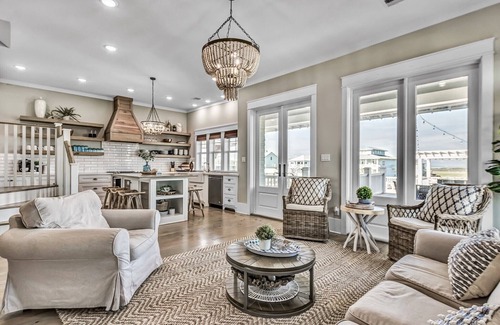 Galveston House | “Flounder Bay” Cheerful 4 bedroom Canal House with Boat Slip!