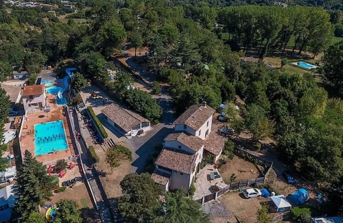 Anduze House | Flower CAMPING FAUVETS * - Mobile home TRIBU Premium 62m2 (5 bedrooms + 2 bathrooms) + terrace 25m2 + CLIM + TV+ LV 10 persons