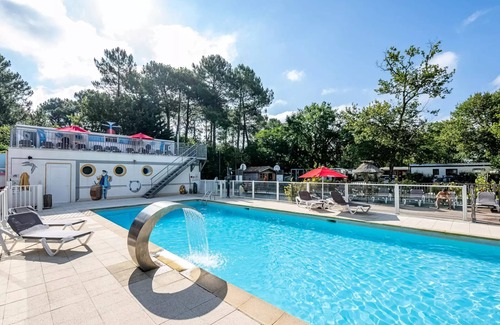 Ares House | Flower Camping La Canadienne * - PREMIUM CLIM mobile home 28m² - 2 bedrooms + semi-covered terrace + TV + sheets + towels included 5 people