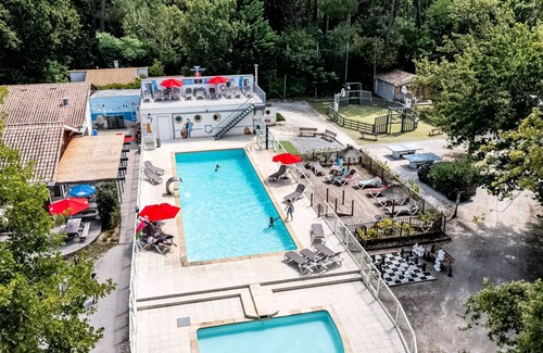 Ares House | Flower Camping La Canadienne * - Mobile home STANDARD - 23m2 - 2 bedrooms - covered terrace + TV 4 persons