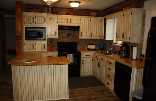 Mount Ida Cabin | Flowers are blooming gearing up for summer. Get your reservations in early