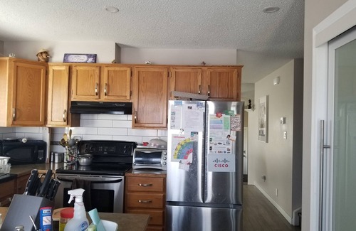 Northwest Calgary House | For female only Bedroom with queen bed