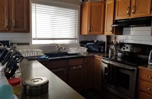 Northwest Calgary House | For female only Bedroom with queen bed