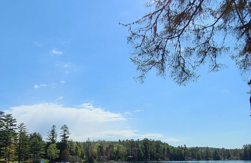 Otter Lake Ski Chalet | Fox Lakehouse is a contemporary four season home with amazing walk in beach.