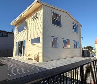 Foxton Beach House | Foxton Beach Bach 5 Star Location 2 Min Walk To Beach New Furnishings BBQ