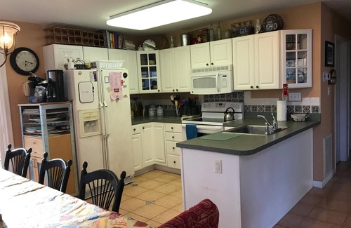 South Bethany Harbor House | FREE ACTIVITIES! Located on the west side only a short walk from South Bethany beach this 5 bedroom, 3 bath family friendly home is just a delight!