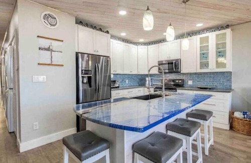New Smyrna Beach Condo | Free Dolphin Views