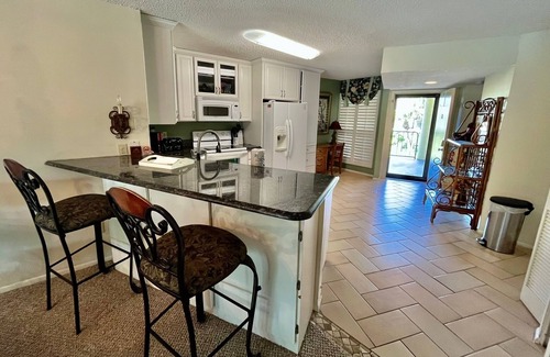 Butler Beach Condo | FREE FUN DAILY with this homey unit bathed with southern exposure, perfect for beach vacation!